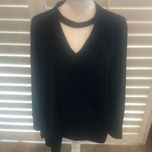 Chico’s black stylish pullover top with key hole stylish key neck. Great basic